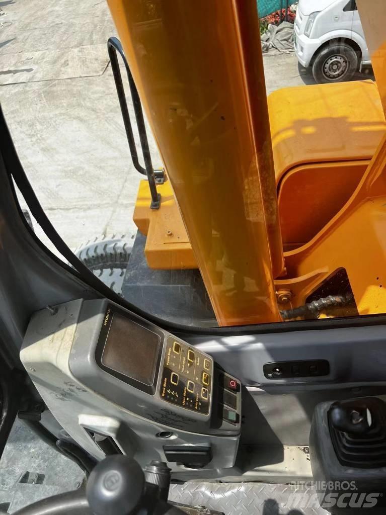 Hyundai 210W-7 Колісні екскаватори