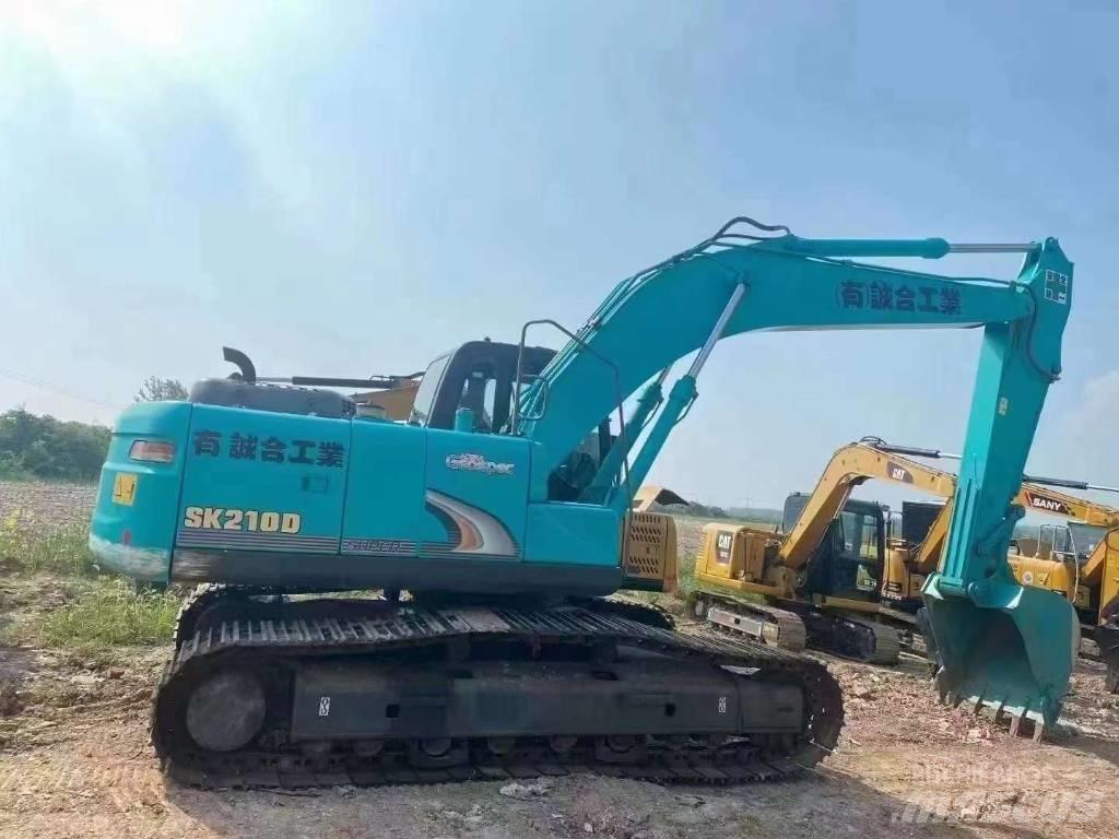 Kobelco SK 210 D Гусеничні екскаватори
