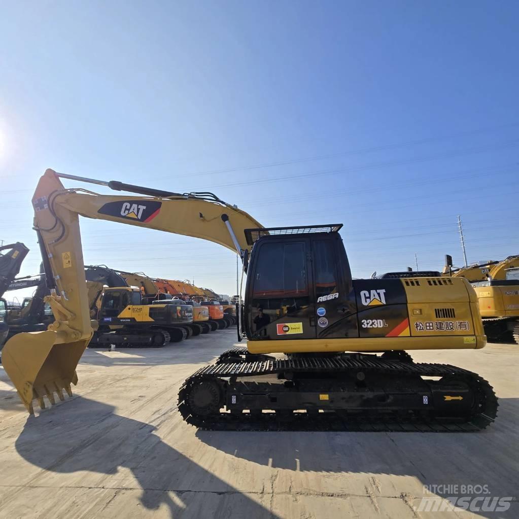 CAT 323 D L Середні екскаватори 7т. - 12т.