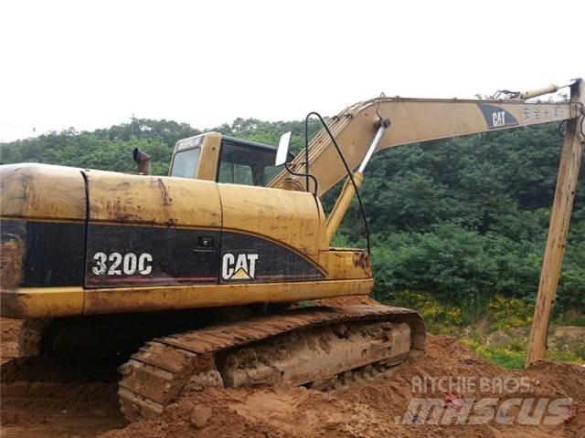 CAT 320 C Екскаватори з великим вилітом