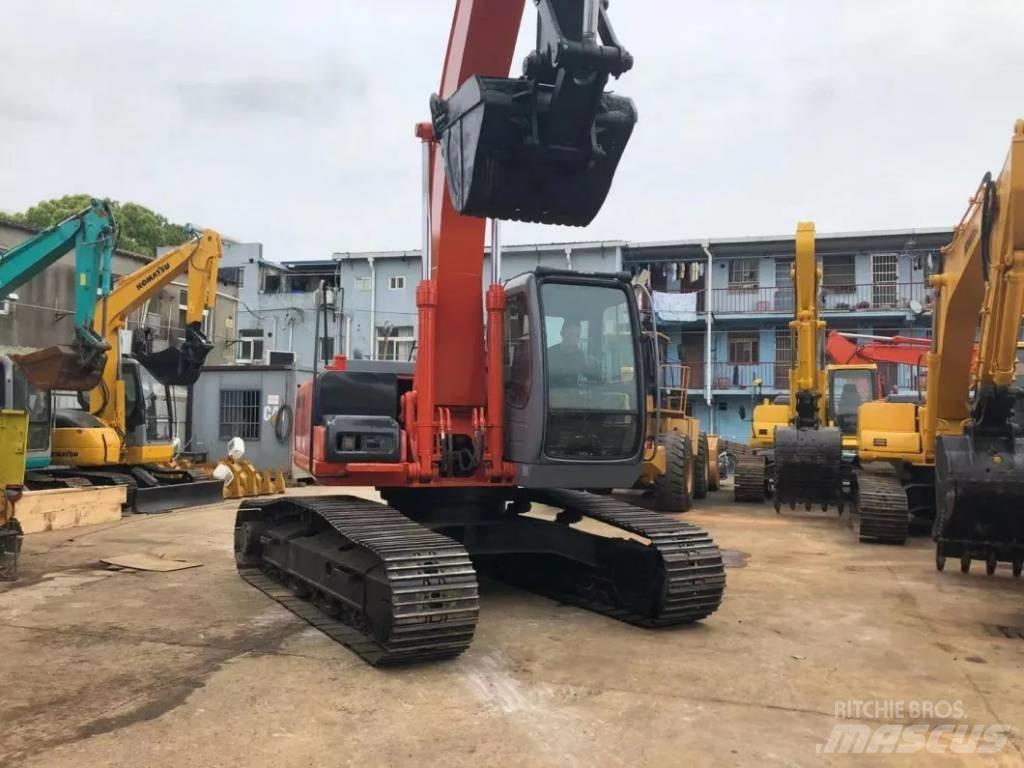 Hitachi ZX 210 Гусеничні екскаватори