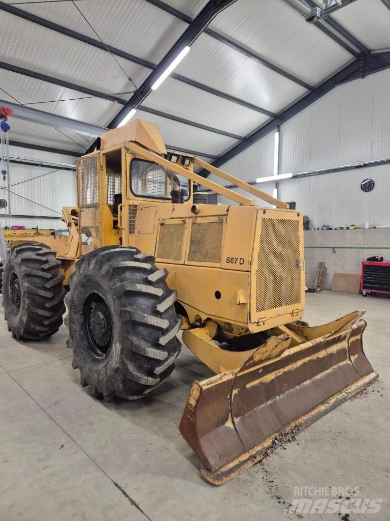John Deere 667d Лісогосподарські трактори
