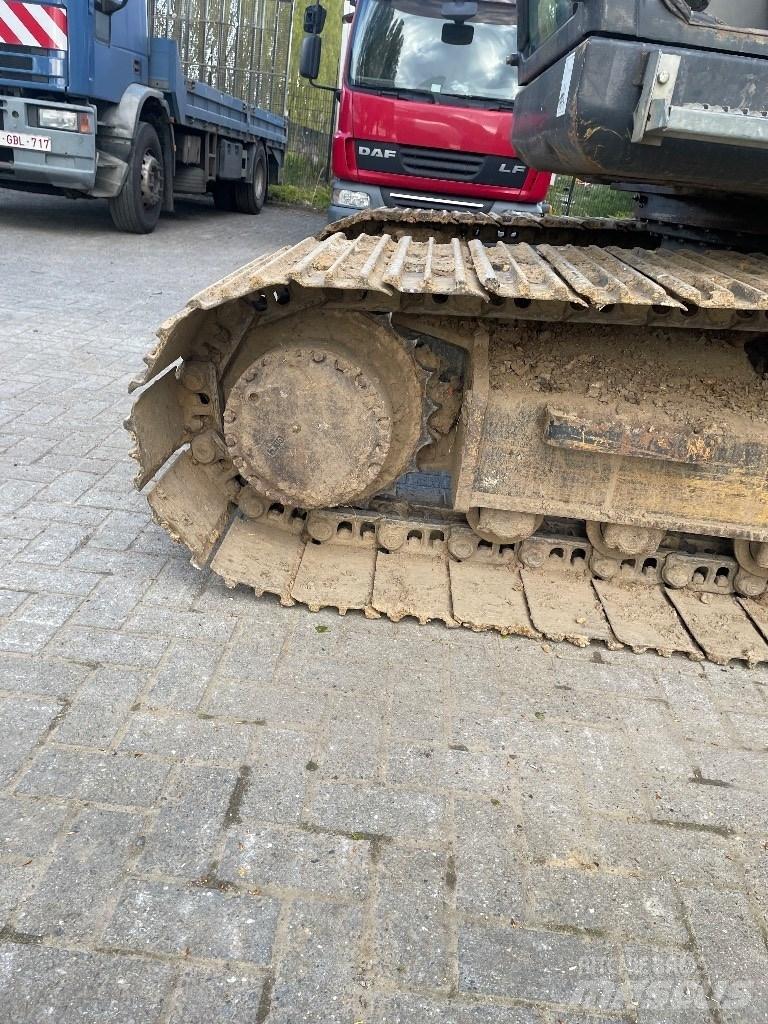 Hyundai 140-7a Гусеничні екскаватори