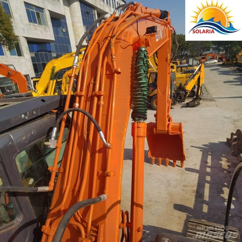 Hitachi ZX 200 Гусеничні екскаватори