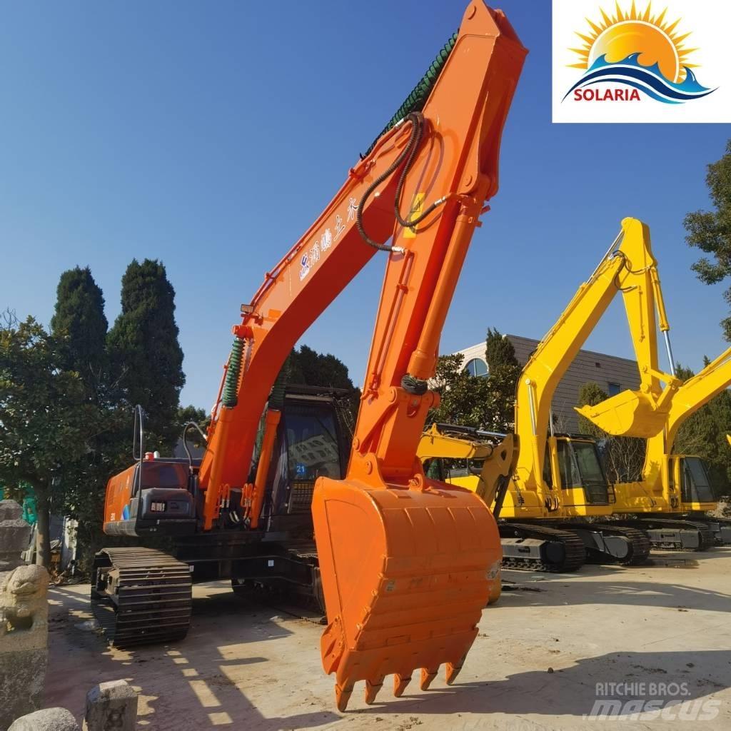 Hitachi ZX 200 Гусеничні екскаватори