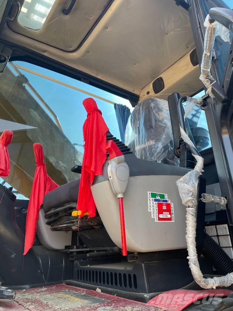 Komatsu PC 210 Гусеничні екскаватори