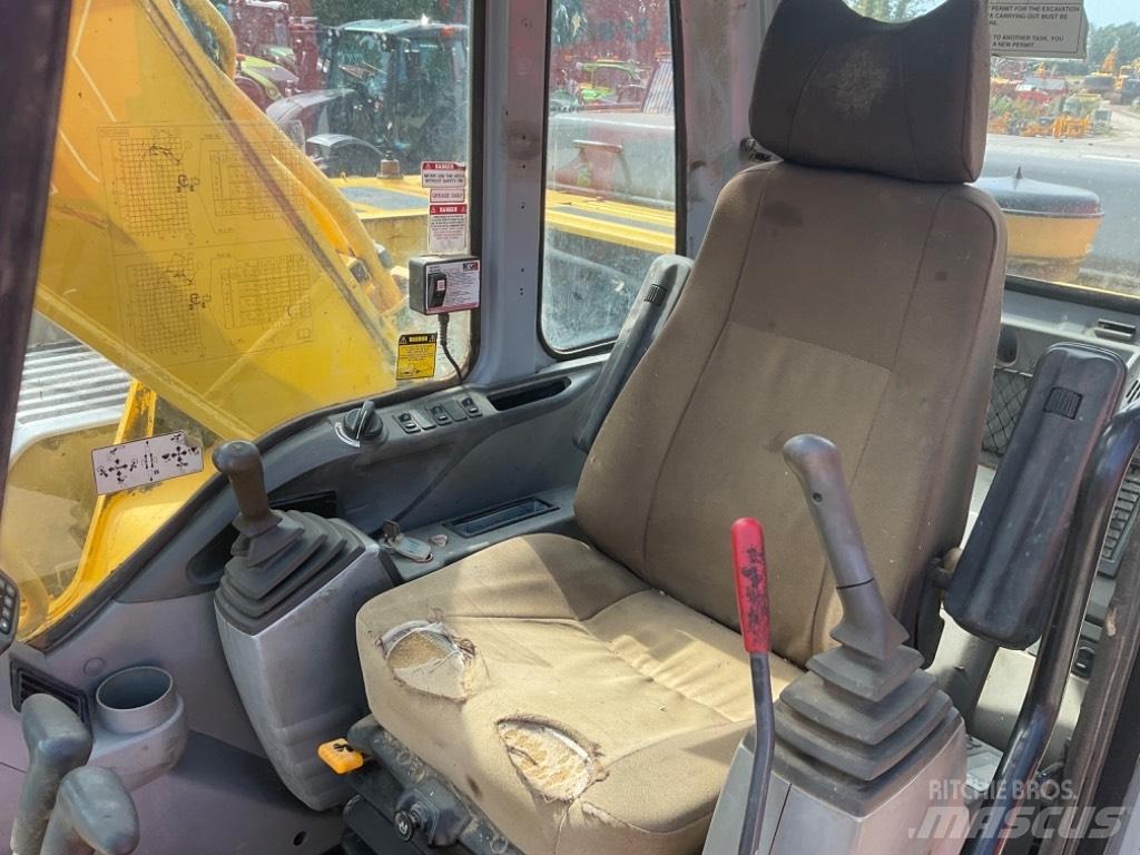 New Holland E 305 Гусеничні екскаватори