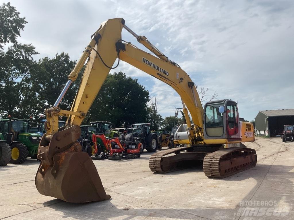 New Holland E 305 Гусеничні екскаватори