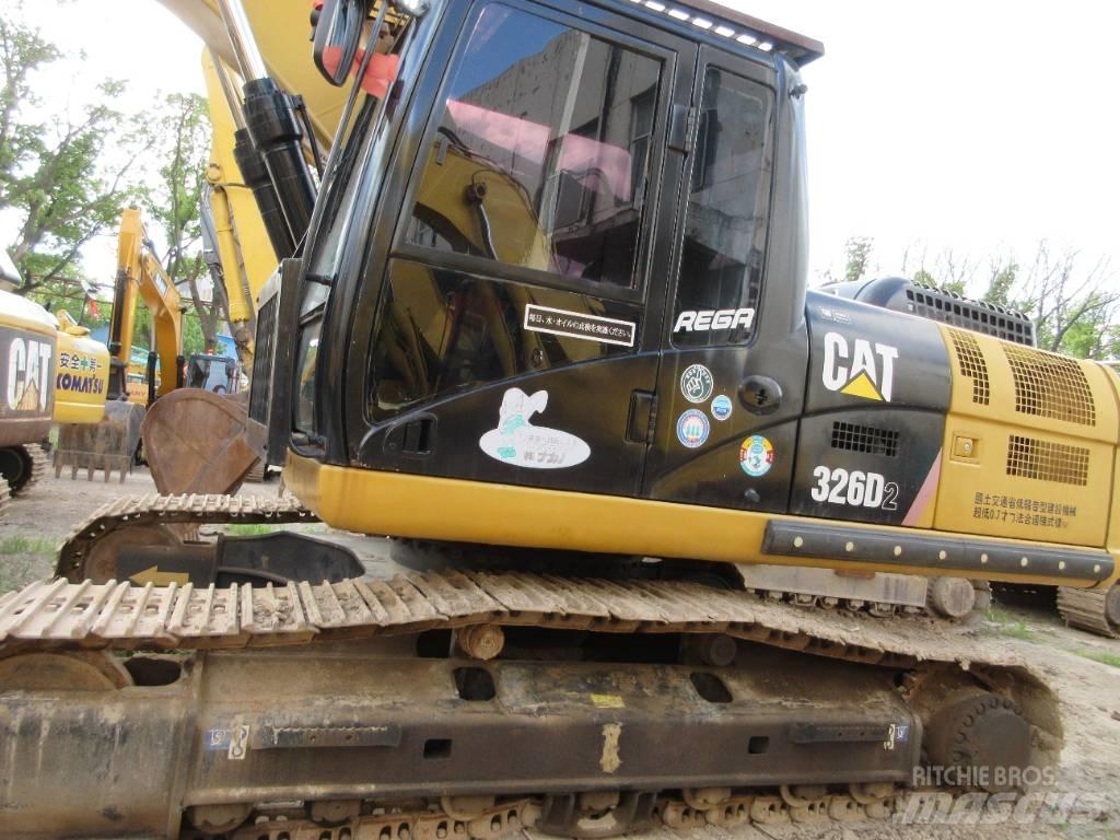 CAT 326 Гусеничні екскаватори