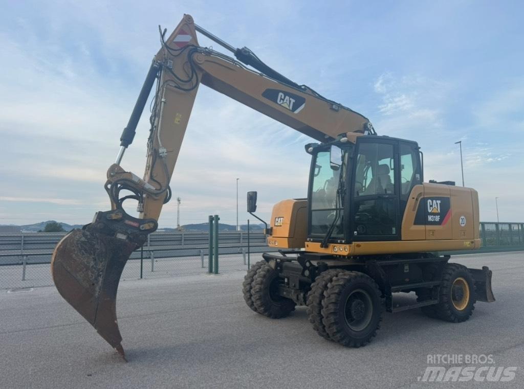 CAT M 318 F Колісні екскаватори