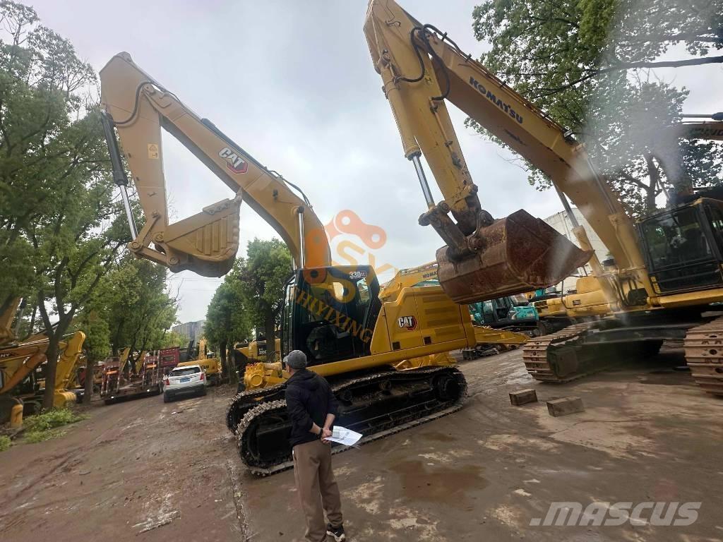 CAT 330 Гусеничні екскаватори