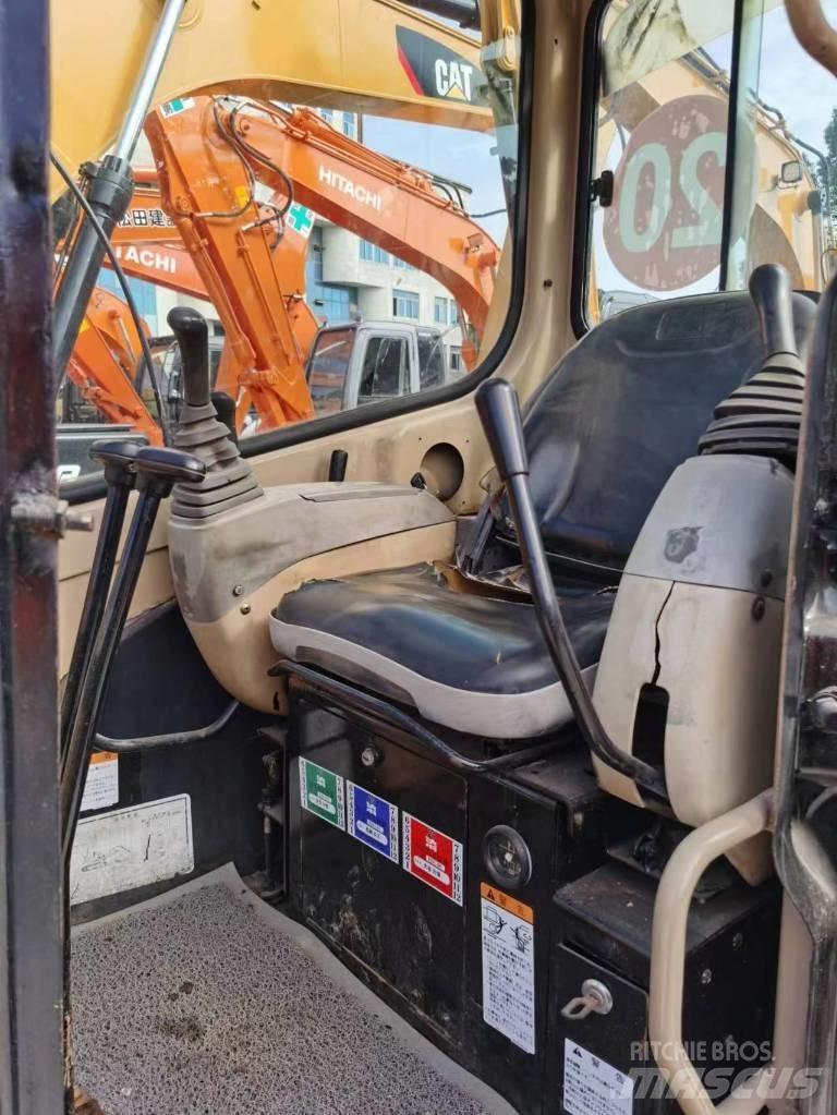 CAT 303 Міні-екскаватори < 7т