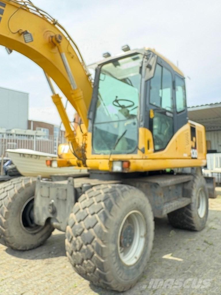Komatsu PW 130-7K Колісні екскаватори