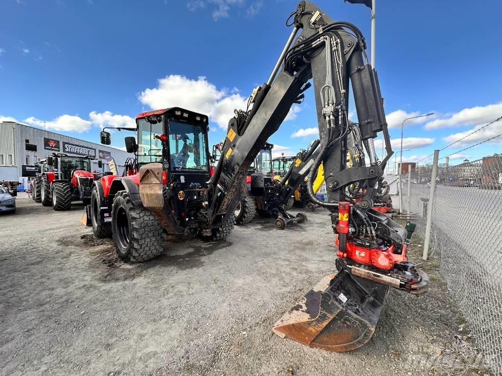 Huddig 1260 C Екскаватори-навантажувачі
