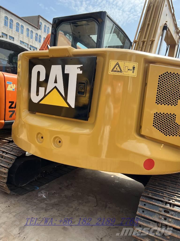 CAT 310 Гусеничні екскаватори