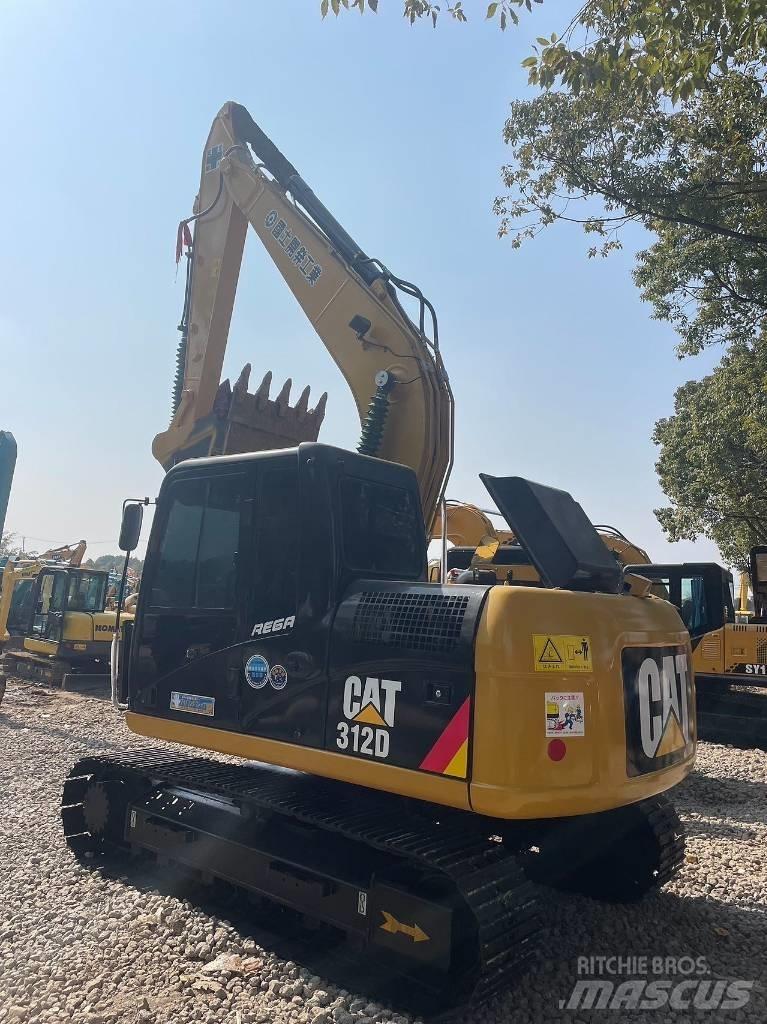 CAT 312 Середні екскаватори 7т. - 12т.