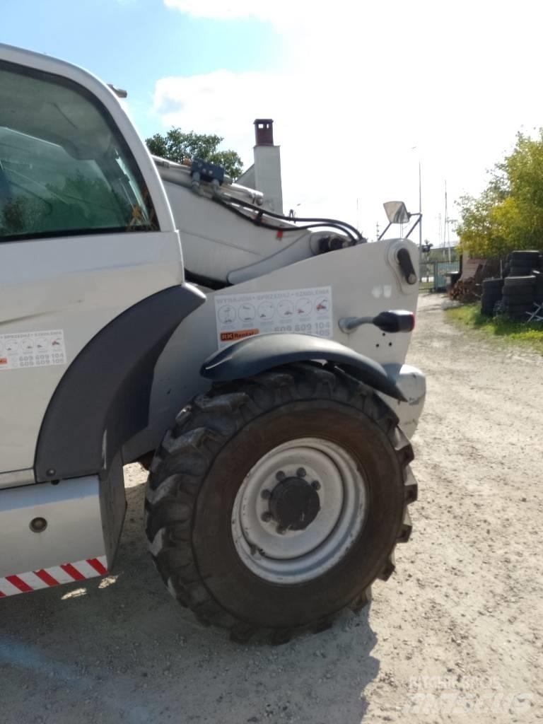 Manitou MT 1440 Екскаватори-навантажувачі