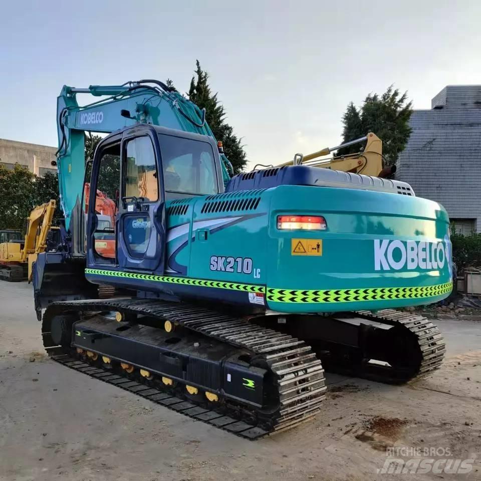 Kobelco SK 210 Гусеничні екскаватори