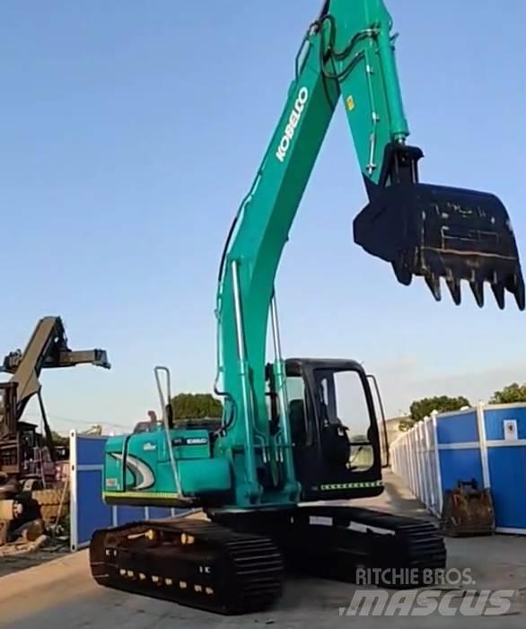Kobelco SK 210 Гусеничні екскаватори