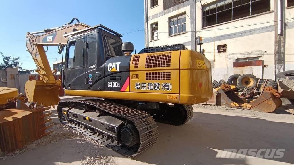CAT 330 Гусеничні екскаватори