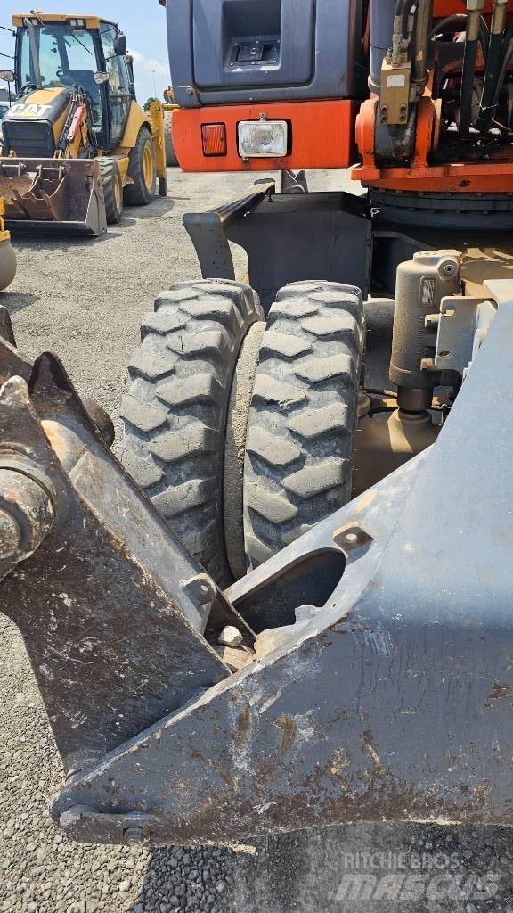 Fiat-Kobelco E215W Колісні екскаватори