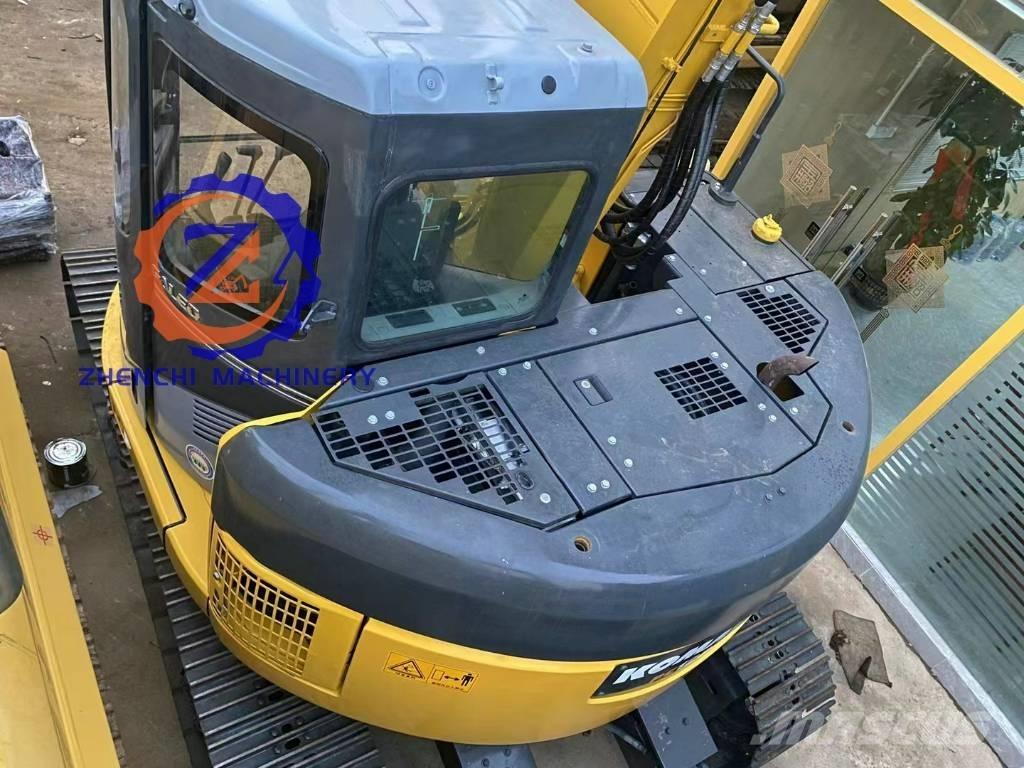 Komatsu PC 128 US Середні екскаватори 7т. - 12т.