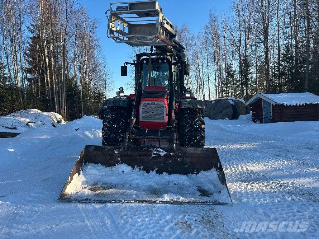 Huddig 1260 C Екскаватори-навантажувачі