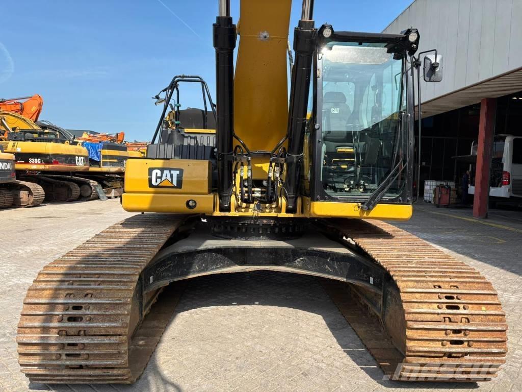 CAT 330 Гусеничні екскаватори
