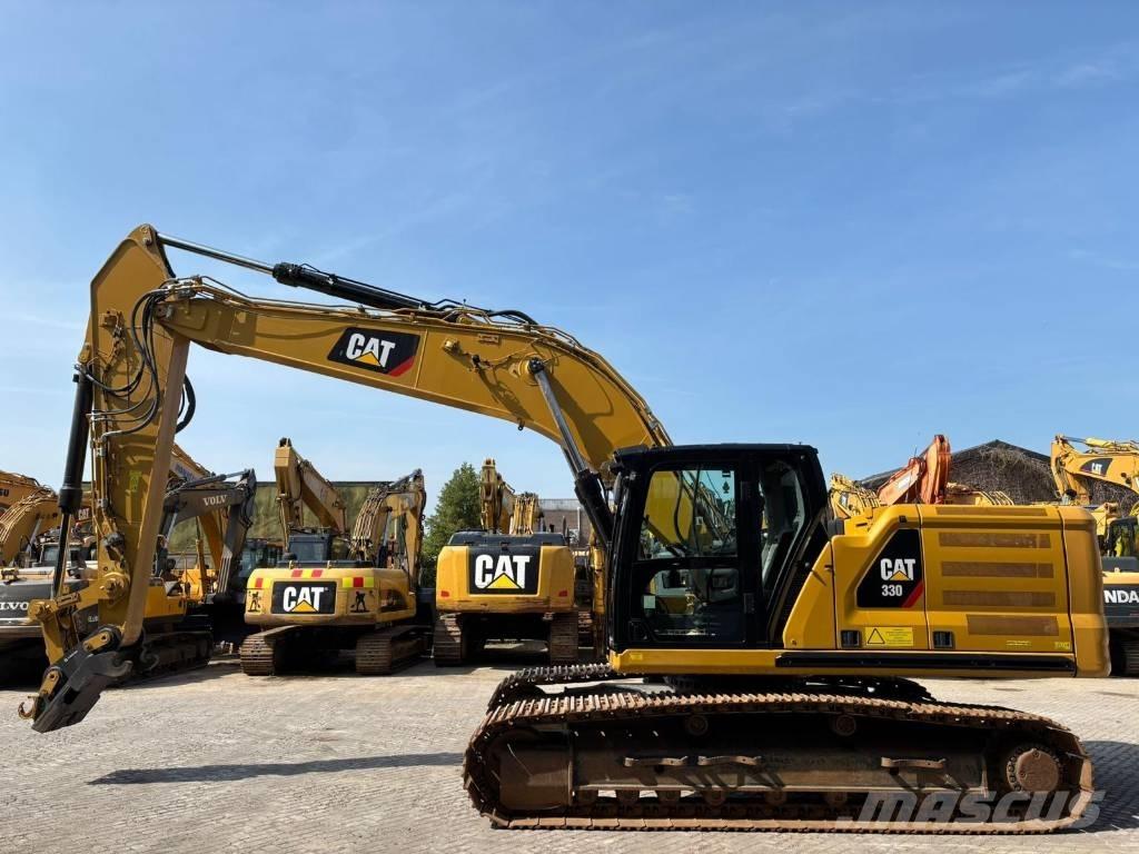CAT 330 Гусеничні екскаватори