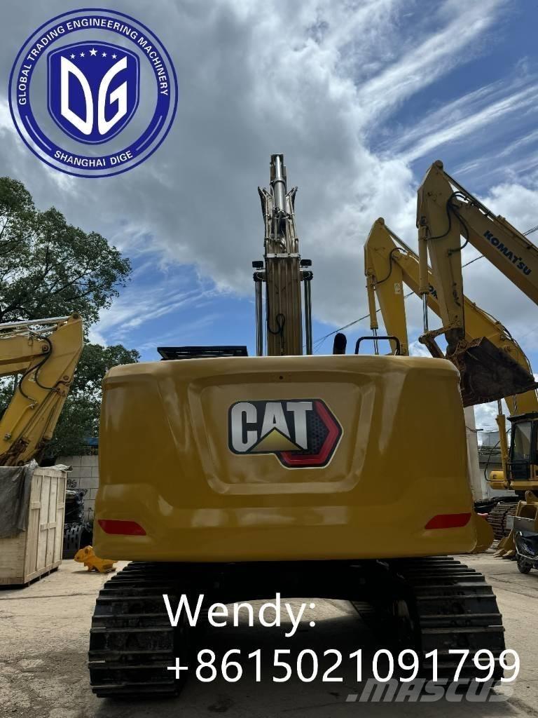 CAT 323 Гусеничні екскаватори