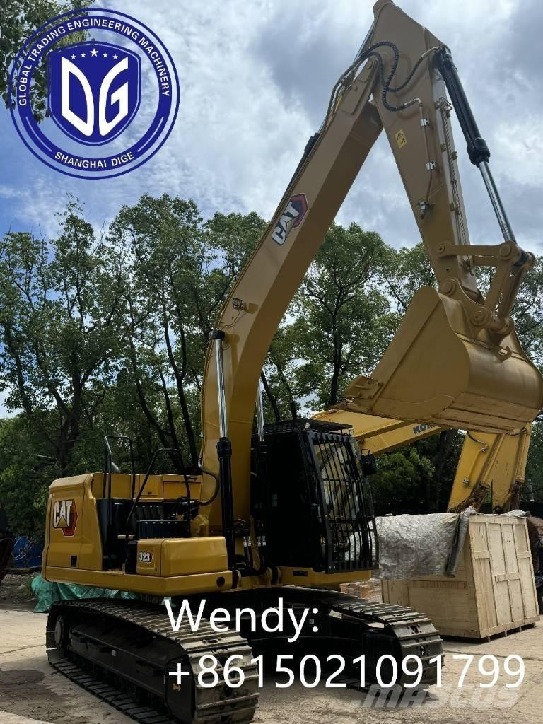 CAT 323 Гусеничні екскаватори