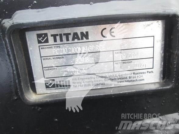 Titan CAT 320 Ковші