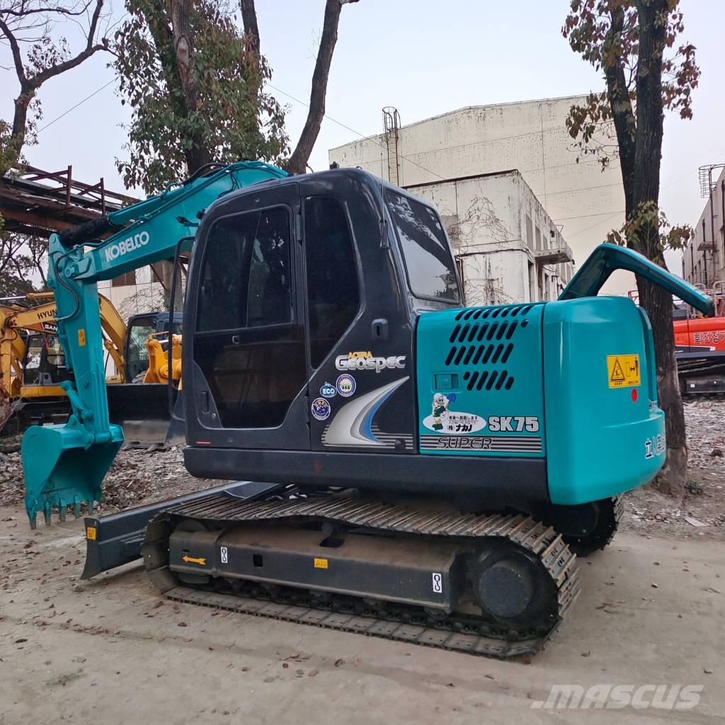 Kobelco SK75 Середні екскаватори 7т. - 12т.