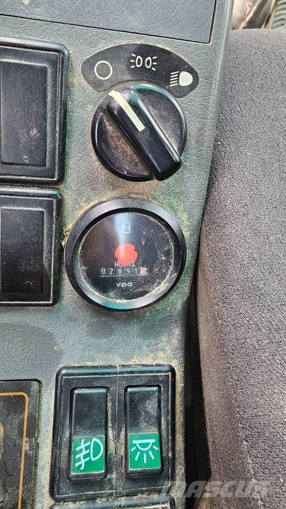 Volvo EW 140 B Колісні екскаватори