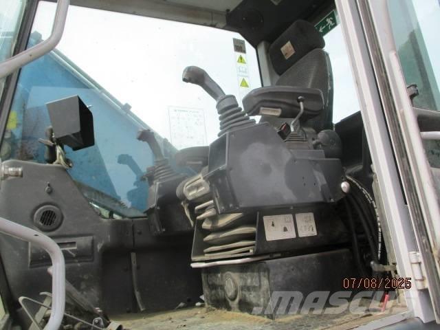 Fuchs MHL 320 Перевантажувачі металобрухту/промислові навантажувачі