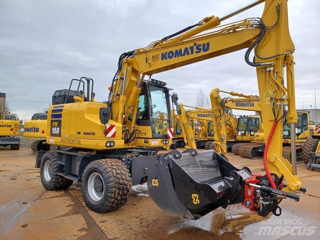 Komatsu PW158-11E0 Колісні екскаватори
