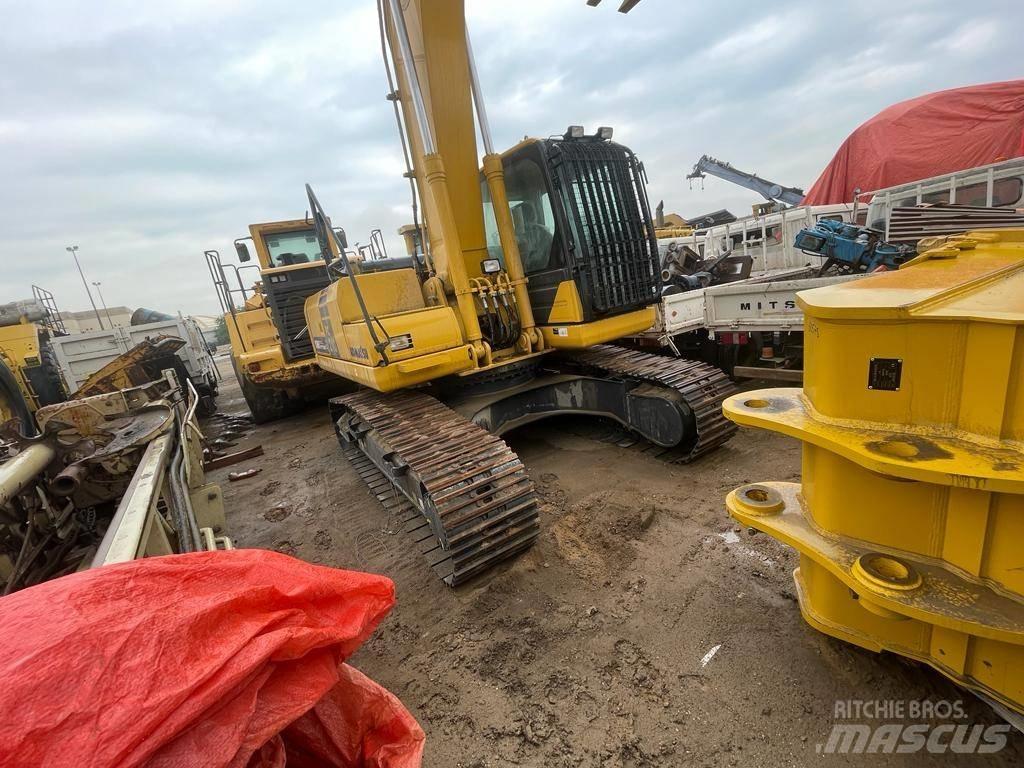 Komatsu PC210-10MO Гусеничні екскаватори