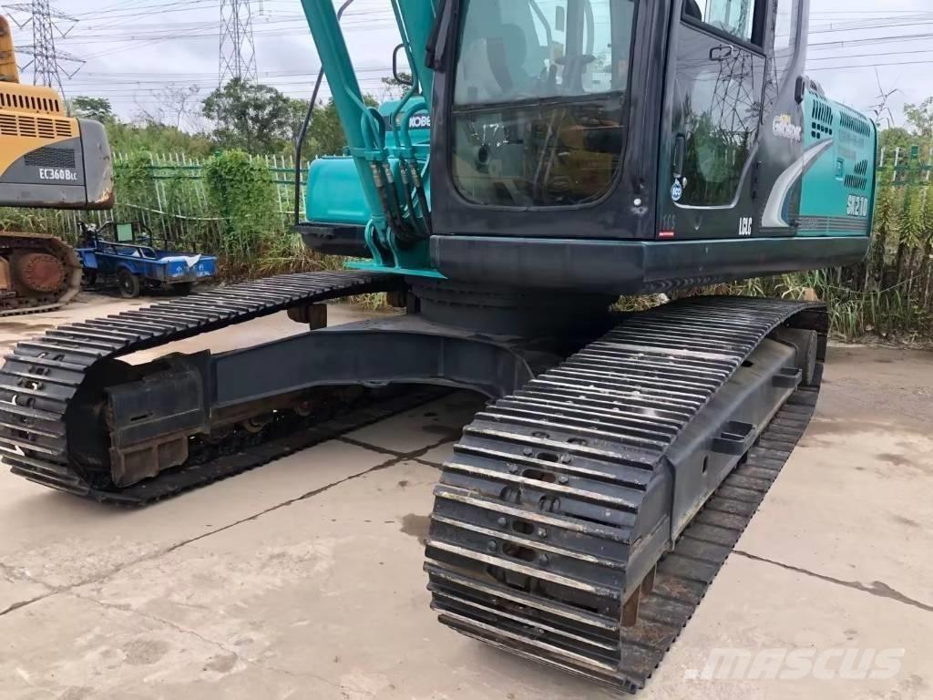 Kobelco SK 210 Гусеничні екскаватори