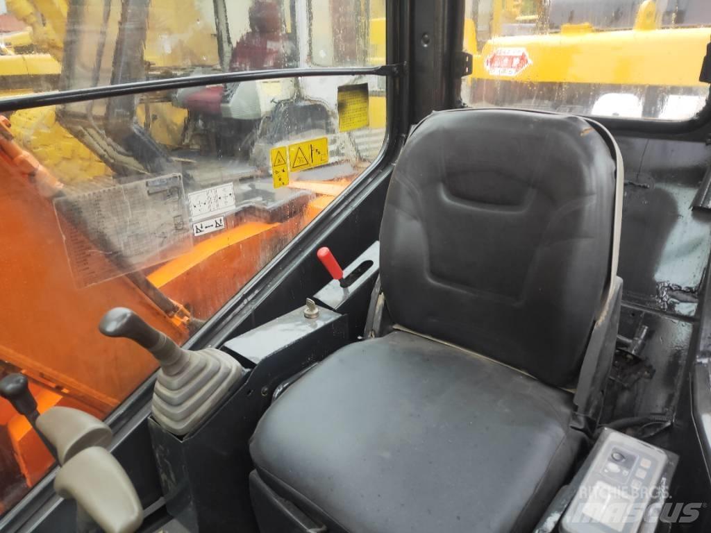 Hitachi ZX55 Міні-екскаватори < 7т