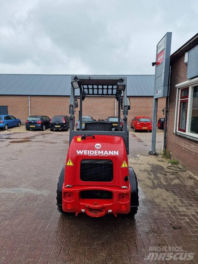 Weidemann 1160 Багатофункціональне обладнання для вантажних і землекопальних робіт