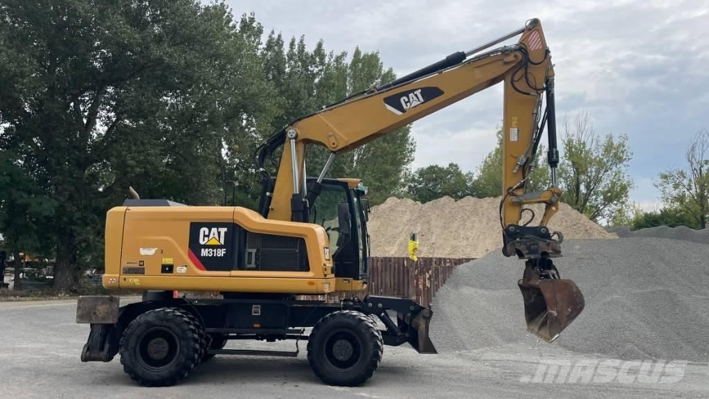 CAT M 318 F Екскаватори-навантажувачі
