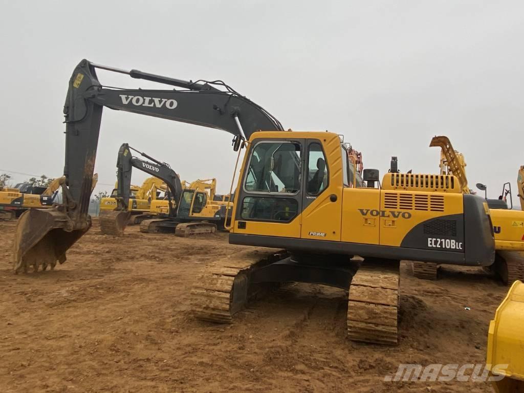Volvo EC210B Гусеничні екскаватори