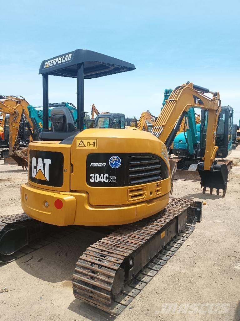 CAT 304 C Гусеничні екскаватори