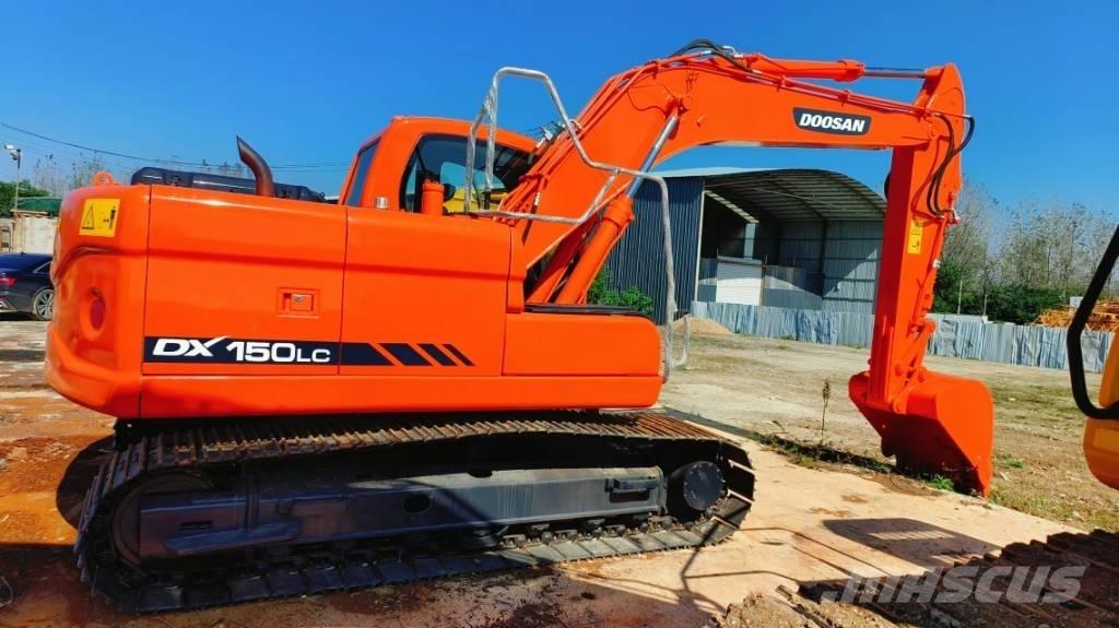 Hitachi ZX 210 Гусеничні екскаватори
