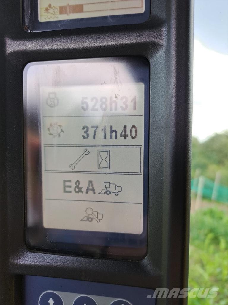 New Holland TC 5.90 Зернозбиральні комбайни