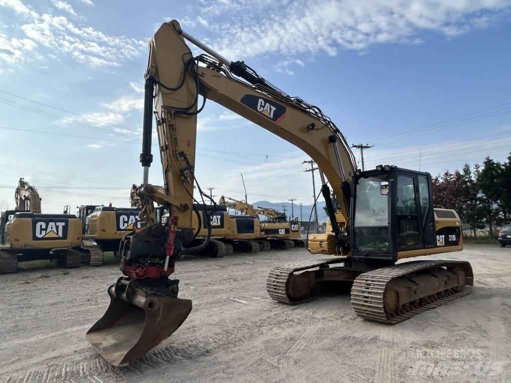 CAT 319 D L Гусеничні екскаватори