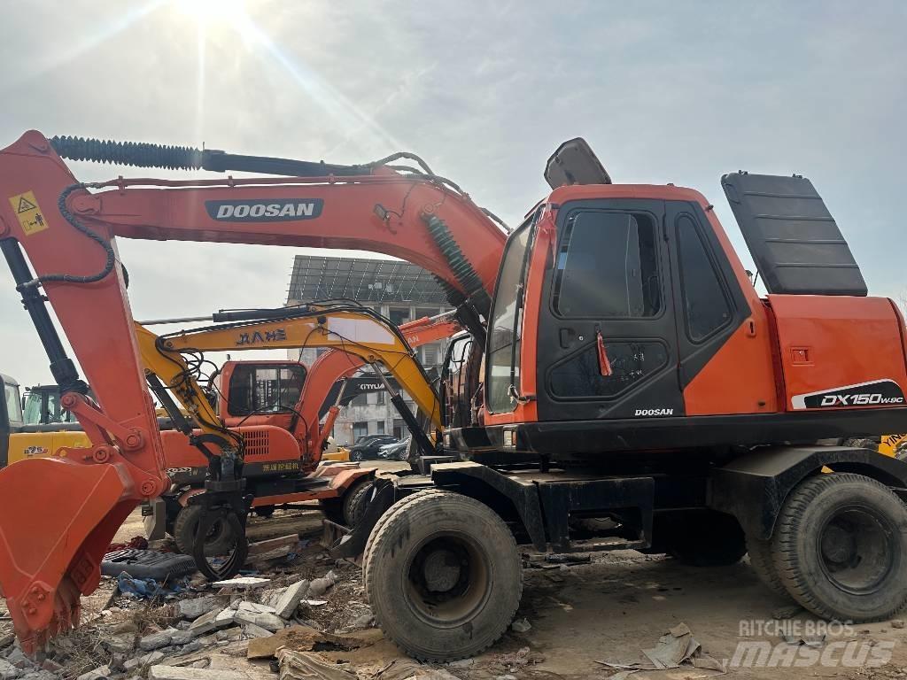 Doosan 150 Колісні екскаватори