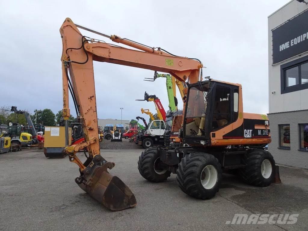 CAT M315 Колісні екскаватори