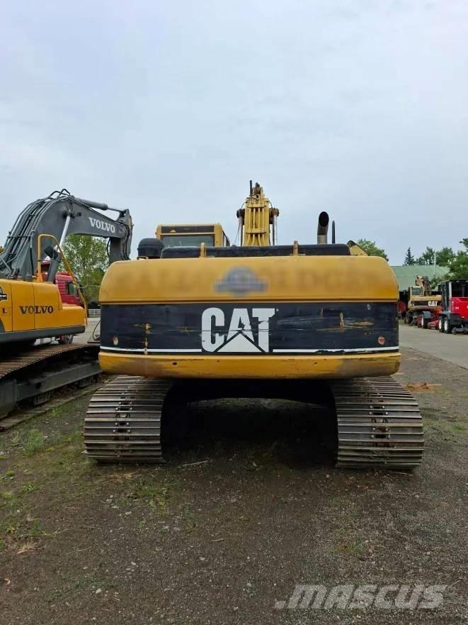 CAT 322 C Гусеничні екскаватори