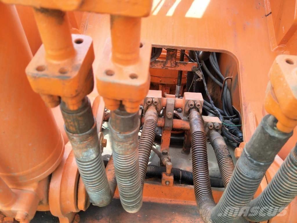 Doosan 225 Гусеничні екскаватори